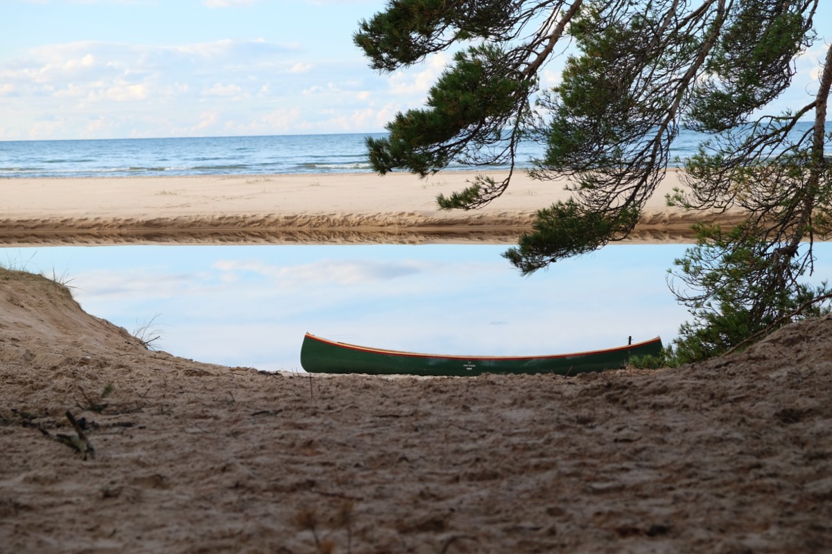 Canoe on a shore of Baltic sea