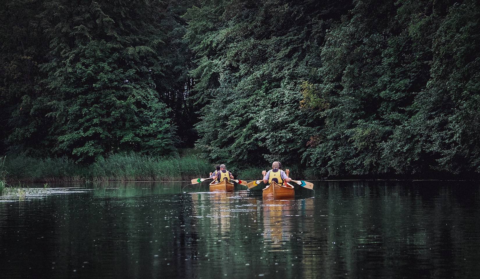 Paddlers in Danė river